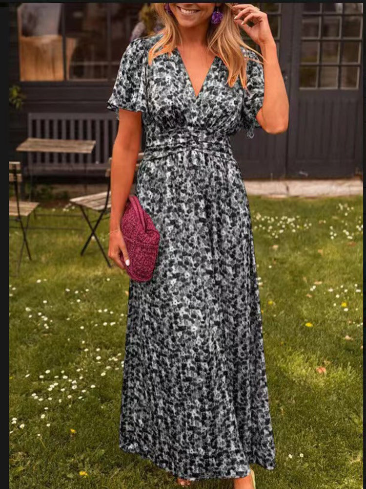 Elis – Longue robe fluide à motif floral