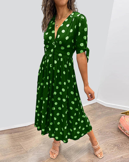 Caterina – Robe midi à pois col V effet sculptant