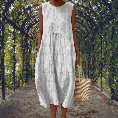 Amandine – Robe midi fluide sans manches avec poches