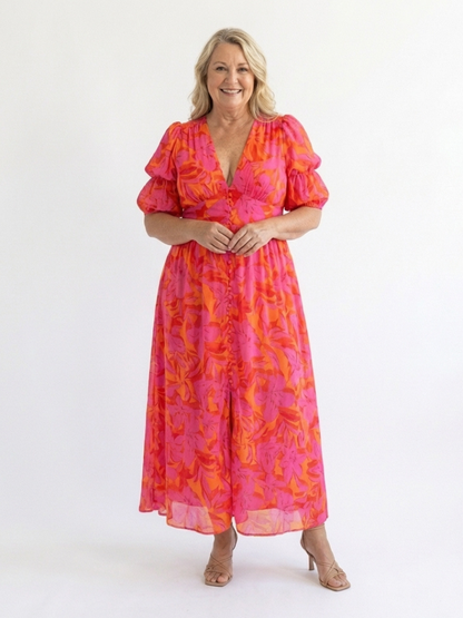 Jade | Robe midi fleurie à col V et manches bouffantes