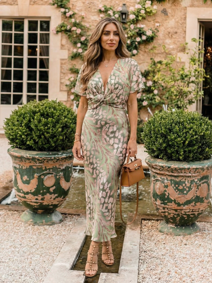 Élodie | Robe midi imprimé abstrait à col V et taille torsadée