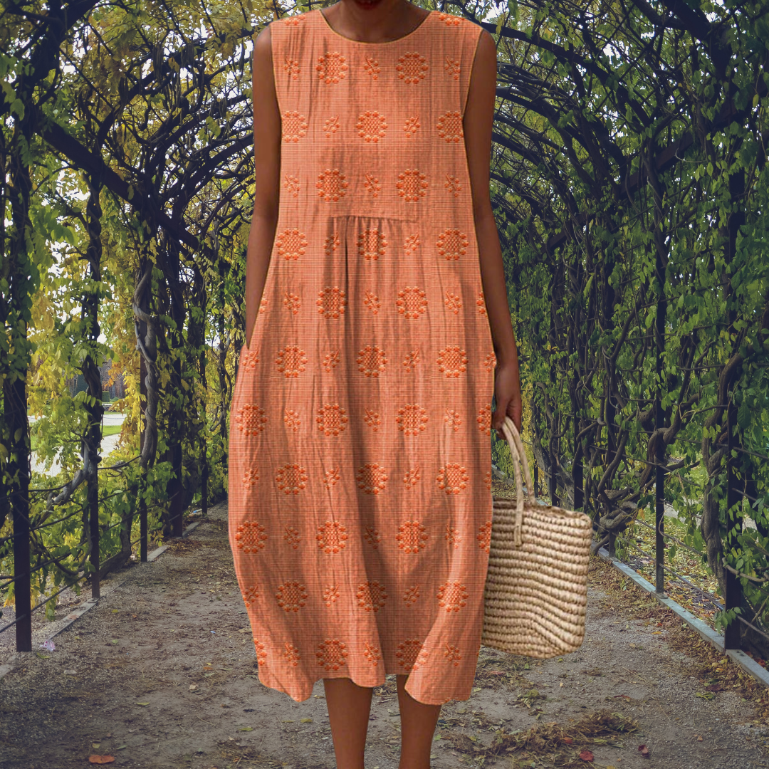 Amandine – Robe midi fluide sans manches avec poches