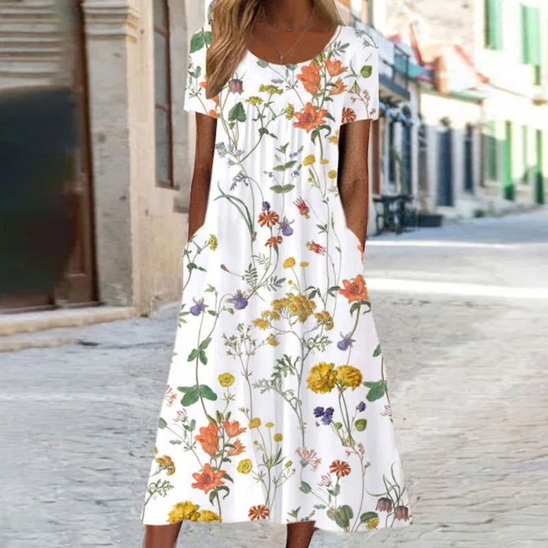 Léora – Robe fluide fleurie effet ventre plat