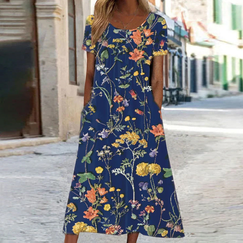 Léora – Robe fluide fleurie effet ventre plat