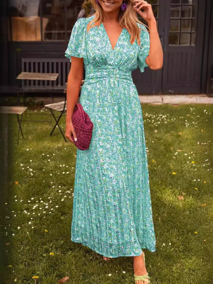 Elis – Longue robe fluide à motif floral