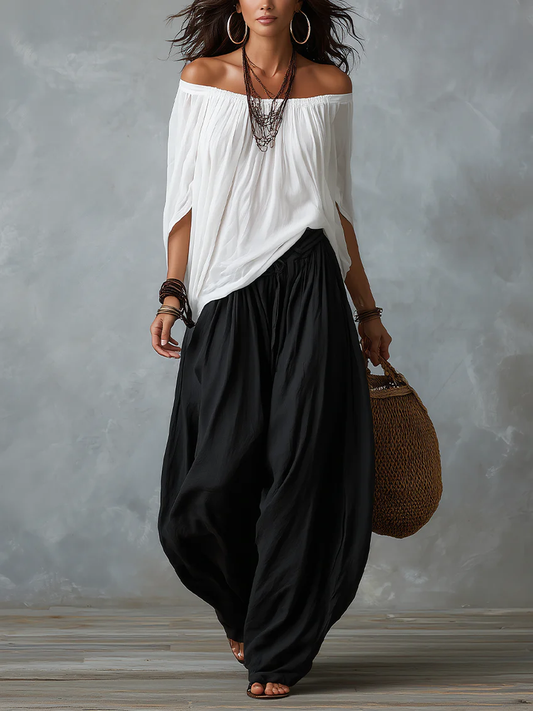 Ensemble haut blanc à épaules dénudées et pantalon évasé style lanterne
