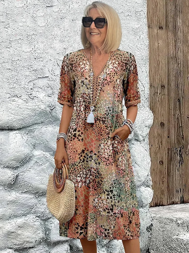 Véronique – Robe midi fluide élégante
