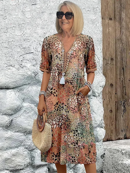 Véronique – Robe midi fluide élégante