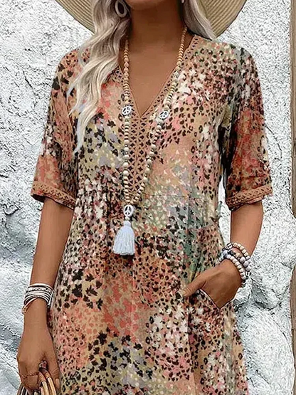 Véronique – Robe midi fluide élégante