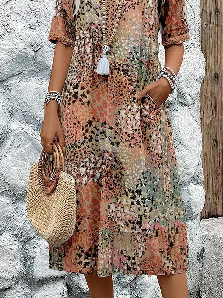 Véronique – Robe midi fluide élégante