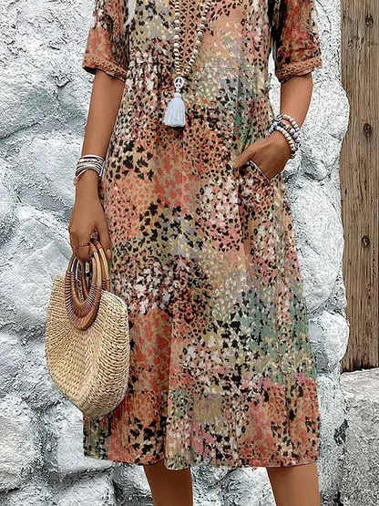 Véronique – Robe midi fluide élégante