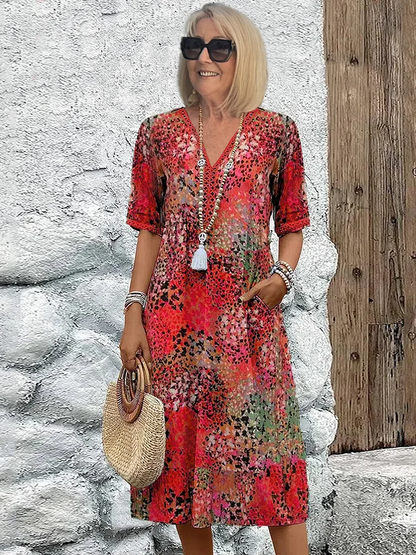 Véronique – Robe midi fluide élégante
