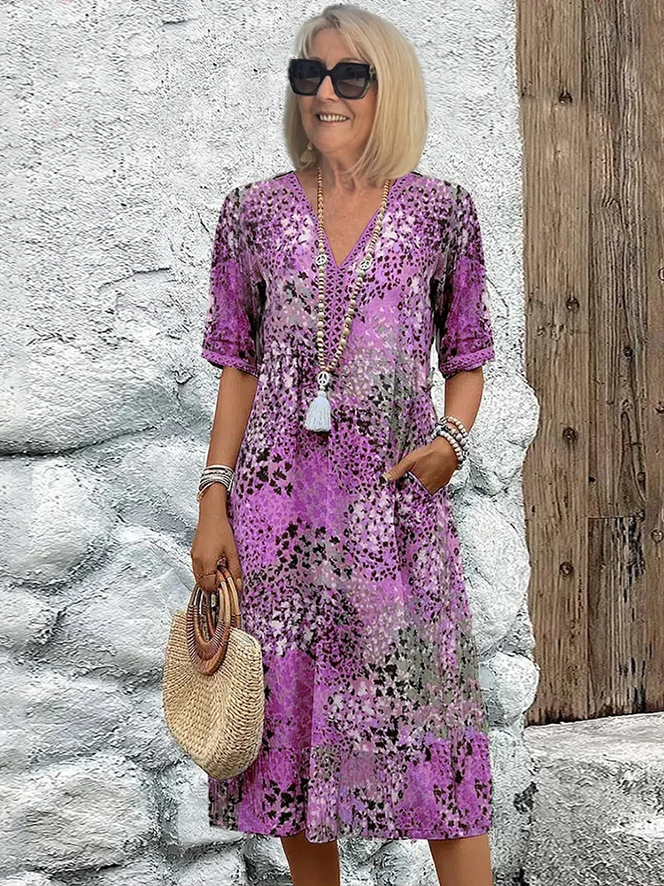 Véronique – Robe midi fluide élégante