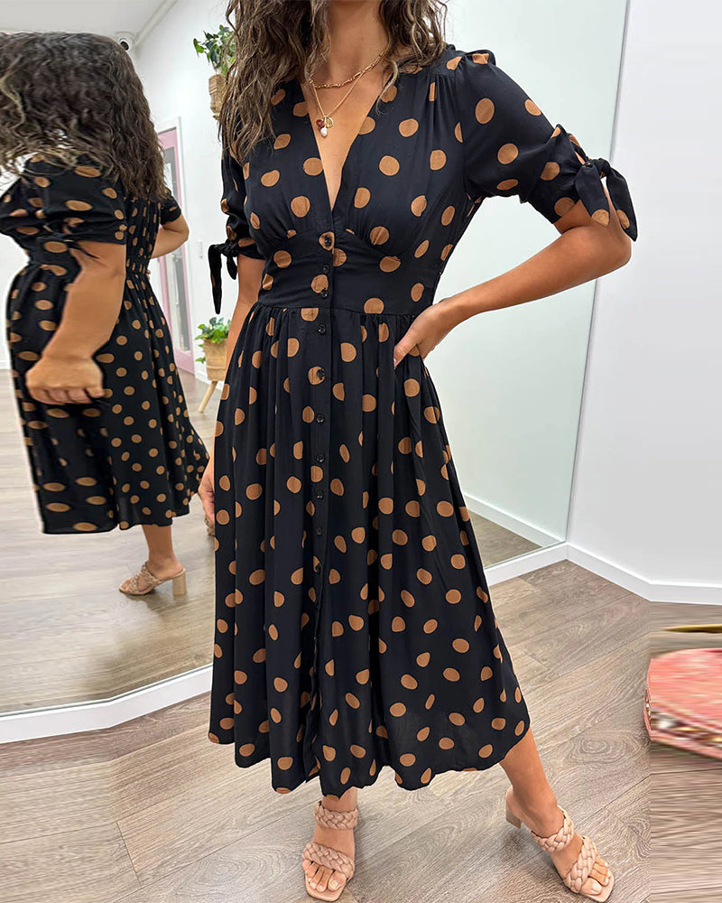 Caterina – Robe midi à pois col V effet sculptant