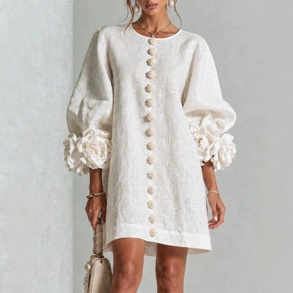 Robe à fleurs avec manches volumineuses et décolleté rond